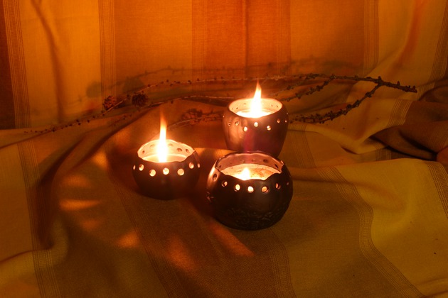Keramikas māla svečturi ar sveci